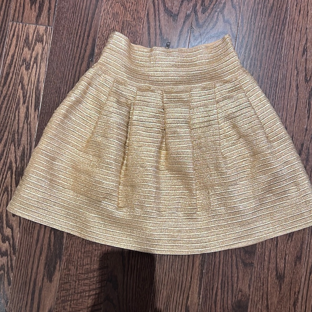 Gold mini skirt by Beulah